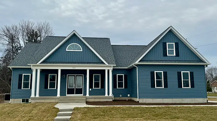 A house painted in blue and white.